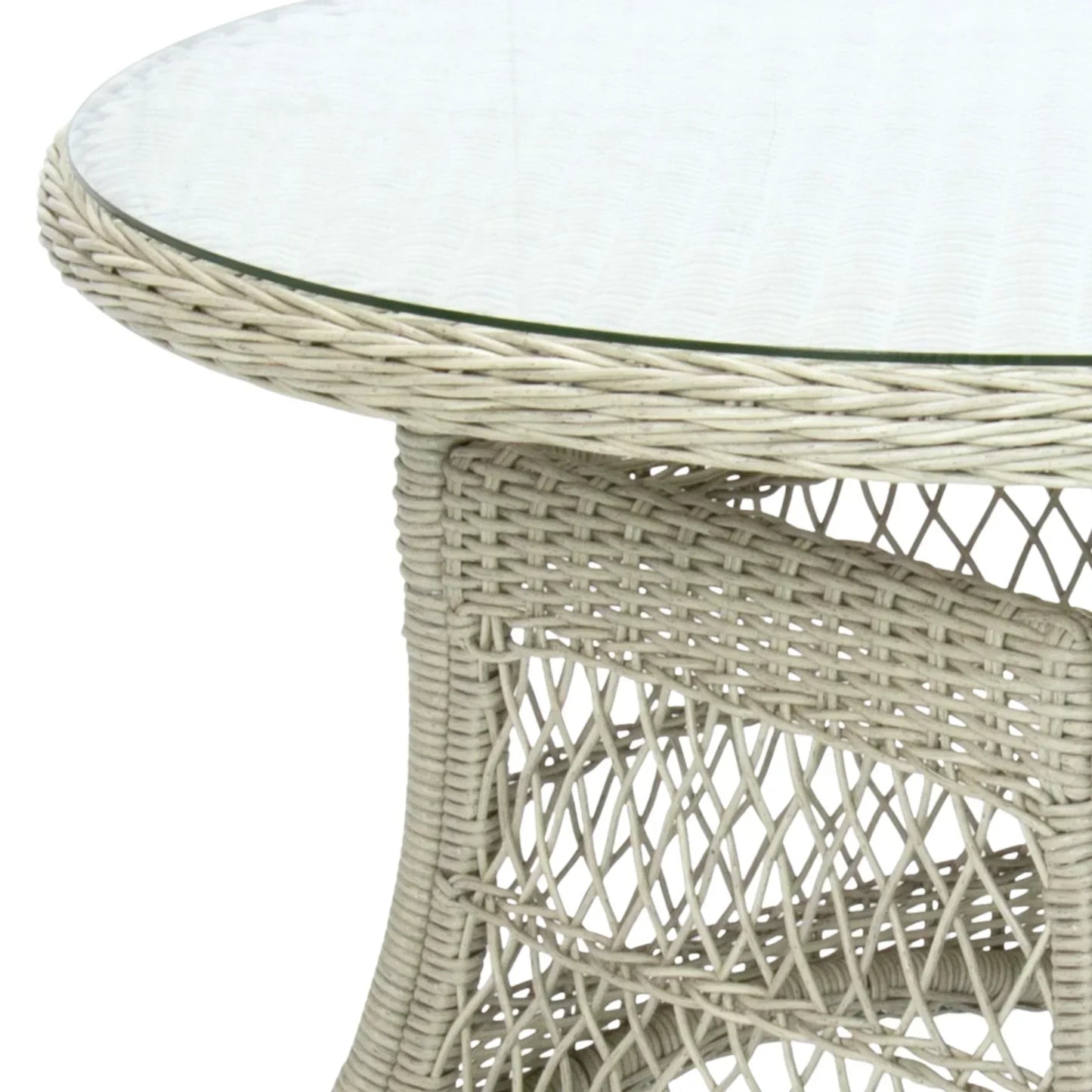 Wicker outdoor table with a glass top